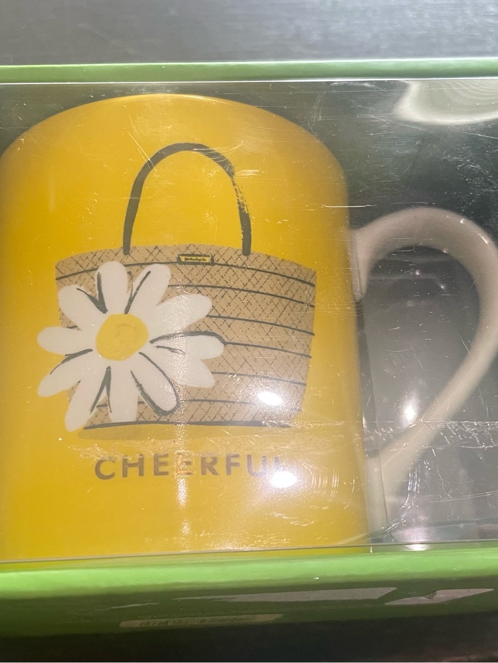 Kate Spade “cheerful” mug.L